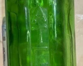 MCM green refrigerator water or juice jar.  https://modestlambestatesales.hibid.com/