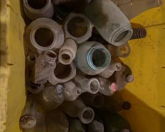 Antique drugstore and milk bottles.  https://modestlambestatesales.hibid.com/