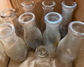 Antique milk bottles. Silver seal. Meadow Gold.  https://modestlambestatesales.hibid.com/