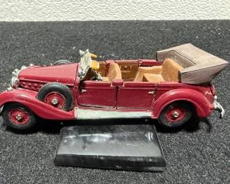 Franklin Mint die cast.  https://modestlambestatesales.hibid.com/