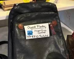 Osgood Marby - leather backpack purse