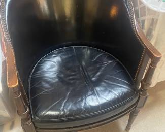 antique black leather chair  needs tlc but overall great for age  