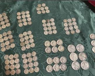 One of several large lots of silver coins in this auction. 