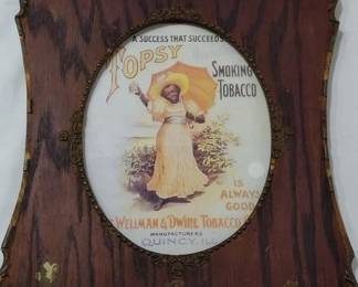 very old antique picture frame with black americana Topsey tobacco advertising. 
