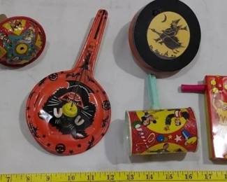 Old tin litho noisemakers for Halloween and New Years, some are signed by the manufacturers. 