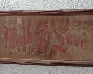 Antique "Walk in Love" sampler in black forest wooden frame. 