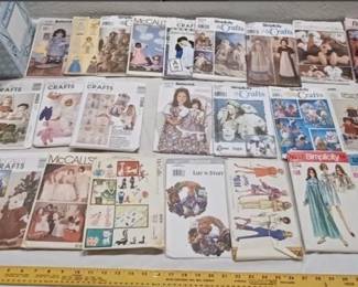 collection of old sewing patterns, most of these are for toy doll clothes. 