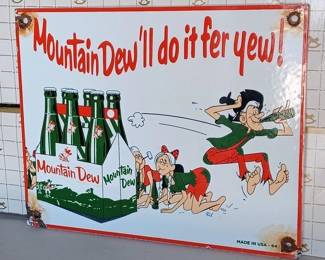 Mountain Dew soda porcelain sign with hillbillies , dated 1965