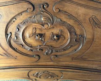 Rococo style hand-carved floral motifs