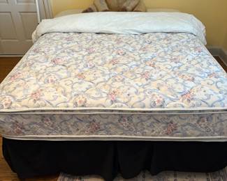 Queen Size Mattress occupied by a large Stuffed Gorilla