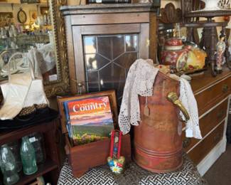 vintage coffee table books, brass coal cuttle, vintage book shelf with door, stool