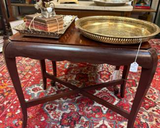 vinage end table, brass tray, vintage books