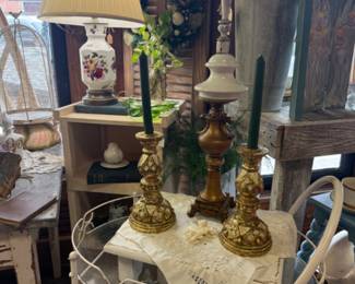 lamps, gold candlesticks, glass punch bowls