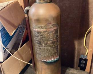 Vintage, brass fire extinguisher made into a lamp