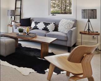 - Live edge coffee table
- Wood and chrome end tables
-Mid Mod wood slop accent chair