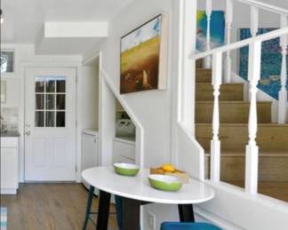 Counter height white lacquer table and turquoise stools