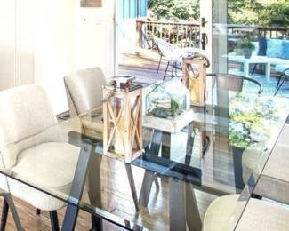 - Saw horse dining table (QTY 3)
- Mid century tan linen dining chairs with nailheads (Qty 4 total)
- Metal farm chairs (qty 2)