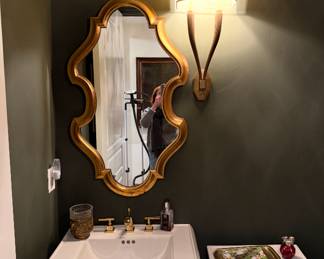 Lovely gold serpentine mirror $250