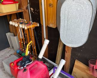 Croquet Set, Gas Cans, Galvenized Wash Tub, oars, etc 