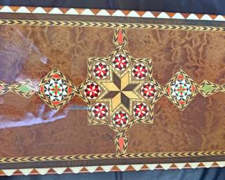Wooden Backgammon set Featuring Intracate Marquetry (wood inlay) on the playing surface and the exterior.