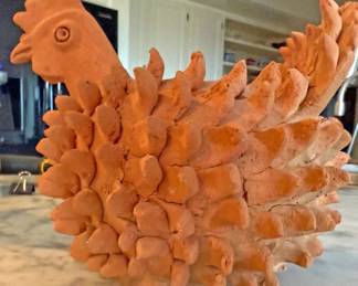Hand-sculpted, unglazed terracotta chicken  