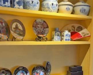 The Yellow Room - filled with paintings, fireplace items, and unique china and glassware.
