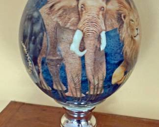 Decorative ostrich egg mounted on vintage candle holder made for the Colonial Candle Company