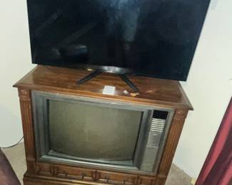 VINTAGE RCA TV AND A SAMSUNG FLAT SCREEN