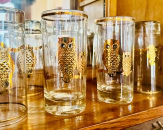Gold owls on glassware