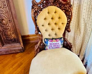Fine example of parlor chair in pale creamy butter color velvet upholstery detailing and carving  with tufted  back