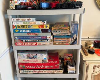 Vintage Board Games and Lionel Train set .Vintage Halloween Costumes in box .