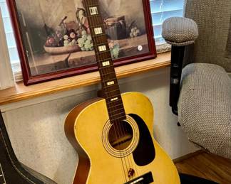 Vintage Silvertone or Harmony guitar...