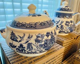 Selection of individually boxed place settings and service pieces of "Blue Willow" by Churchill (detail)...