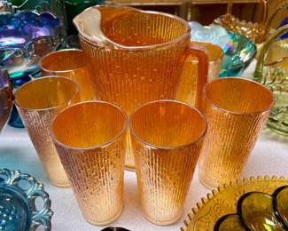 Vintage carnival glass beverage set...