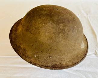 WWl M1917 helmet with intact liner and leather chinstrap...