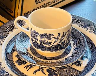 Selection of individually boxed place settings and service pieces of "Blue Willow" by Churchill (detail)...