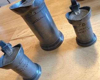Antique French graduated pewter measuring cups 