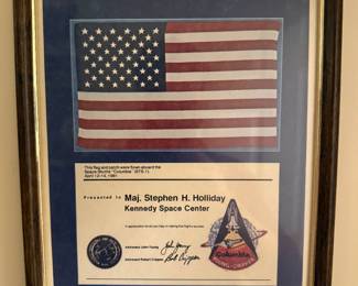 Commemorative presentation plaque, flag flown aboard Space Shuttle Columbia STS-1, the first space shuttle mission, printed/facsimile signatures of John Young & Bob Crippen