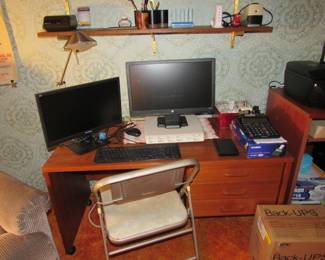 Small desk, monitors, office machines!