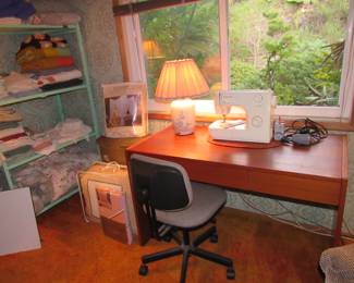 linens, small desk, Singer sewing machine