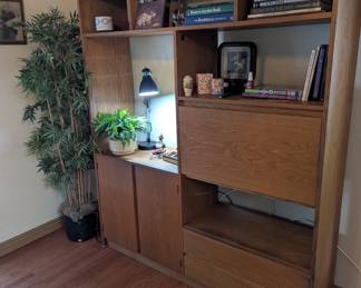Teak wall unit with drop down writers desk.
