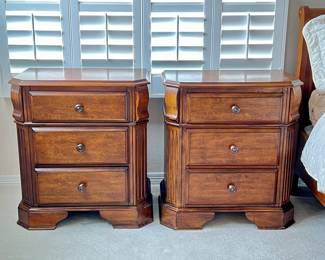 Pair of Warm Wood Three-Drawer Nightstands by Ashley Furniture