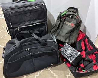 Large Pieces Of Luggage And A Caboodle