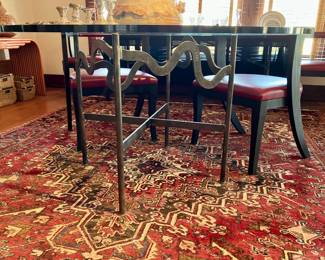 Sculptural wrought iron dining table by Larry Cooper