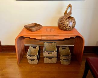Orange waterfall bamboo console