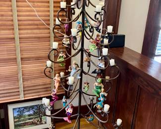 Iron xmas tree covered in December Diamonds mermaid ornaments 