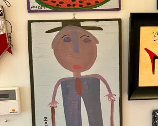 Mose Tolliver watermelon and self portrait paintings