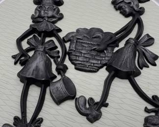 Vintage 1971 Sexton cast metal wall plaque with two female figures.