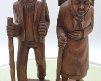 HandCarved Wooden Pilgrim Couple Figurines  Folk Art Travelers with Walking Sticks