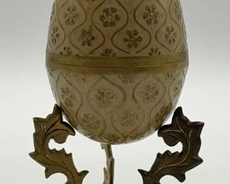 Vintage cloisonne brass egg trinket box with a decorative brass stand.